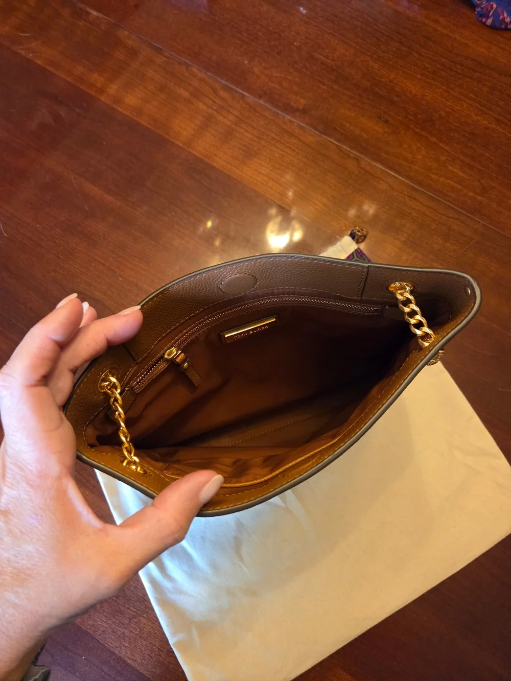 Tory Burch Leather Swingpack With Gold Chain.  Includes Dust Bag